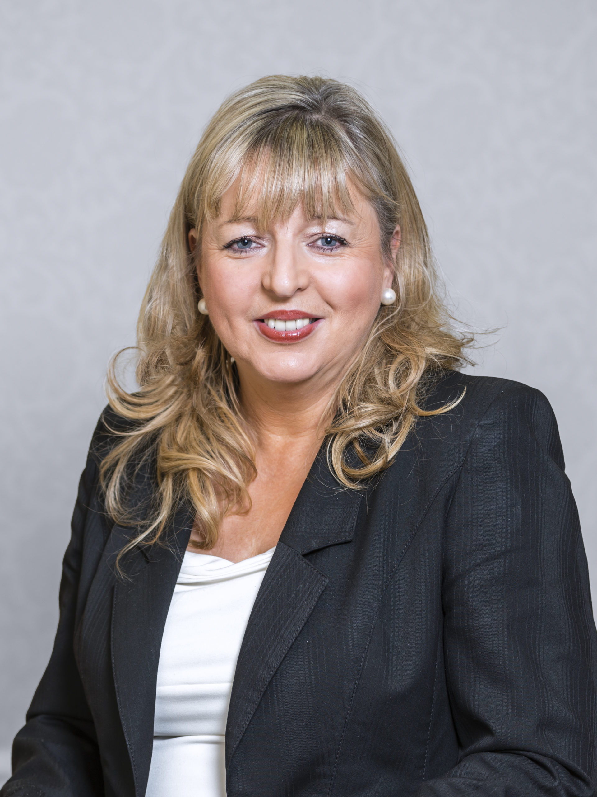 Professional headshot of Bernadette Butler, Executive Coach and Facilitator at Harmonics, supporting leadership development and organisational change programmes.