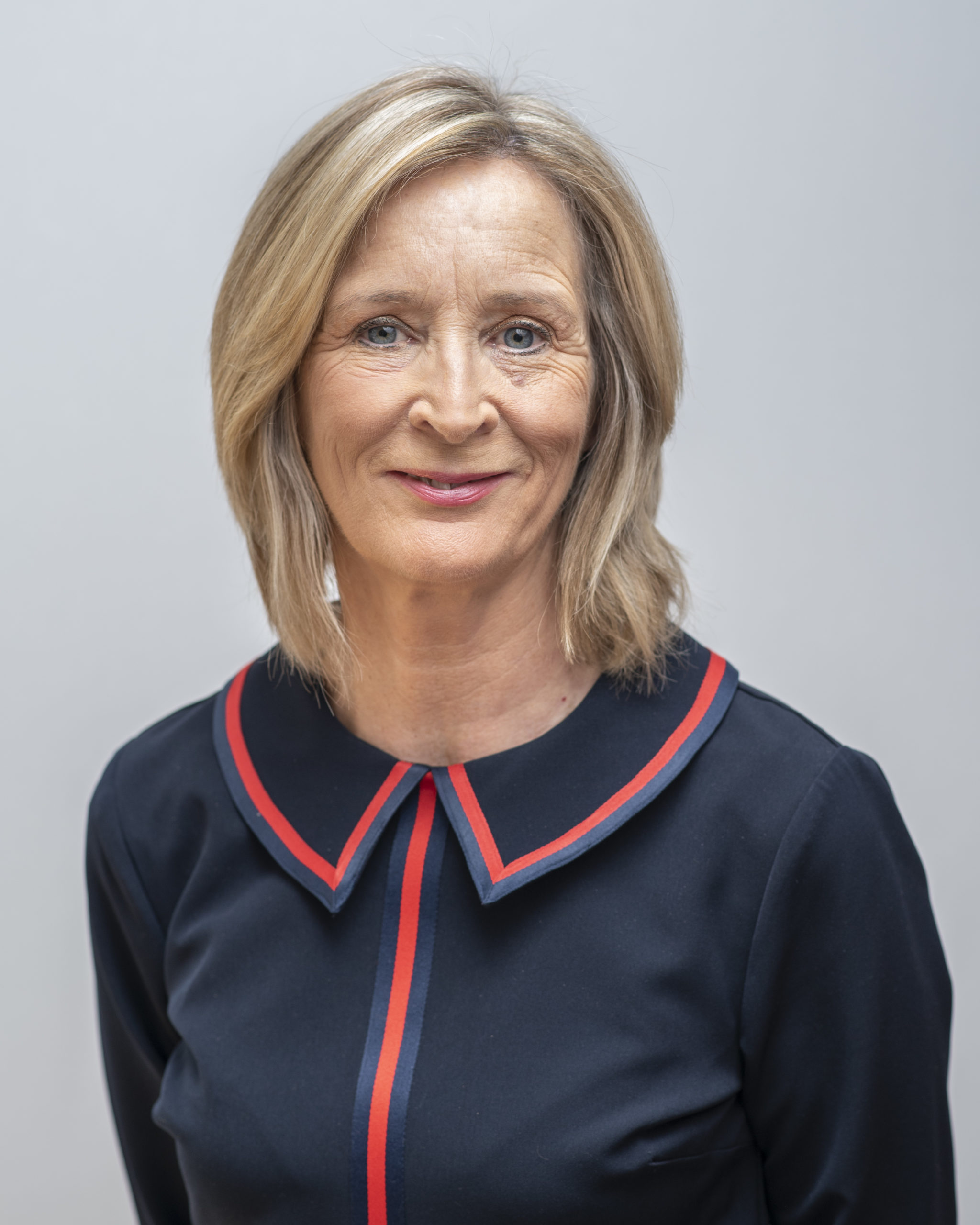 Professional headshot of Valerie O'Riordan, Executive Coach, Facilitator & Organisation Design Consultant, supporting organisations with leadership development, team effectiveness, and organisational transformation.