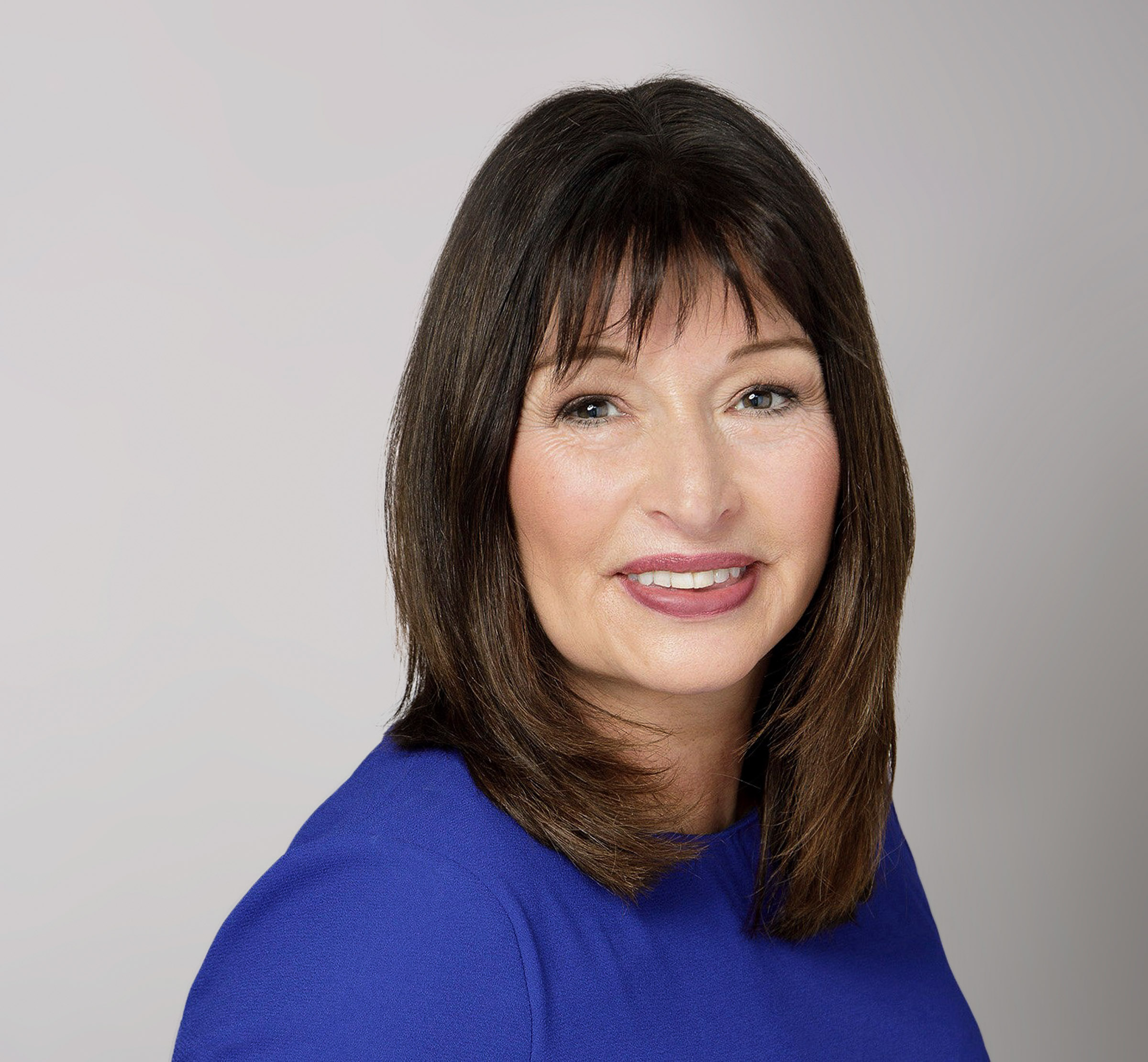 Professional headshot of Diana Dawson, Executive and Transition Coach and Leadership Facilitator at Harmonics, supporting leaders and organisations through career transitions, leadership development, and organisational change.