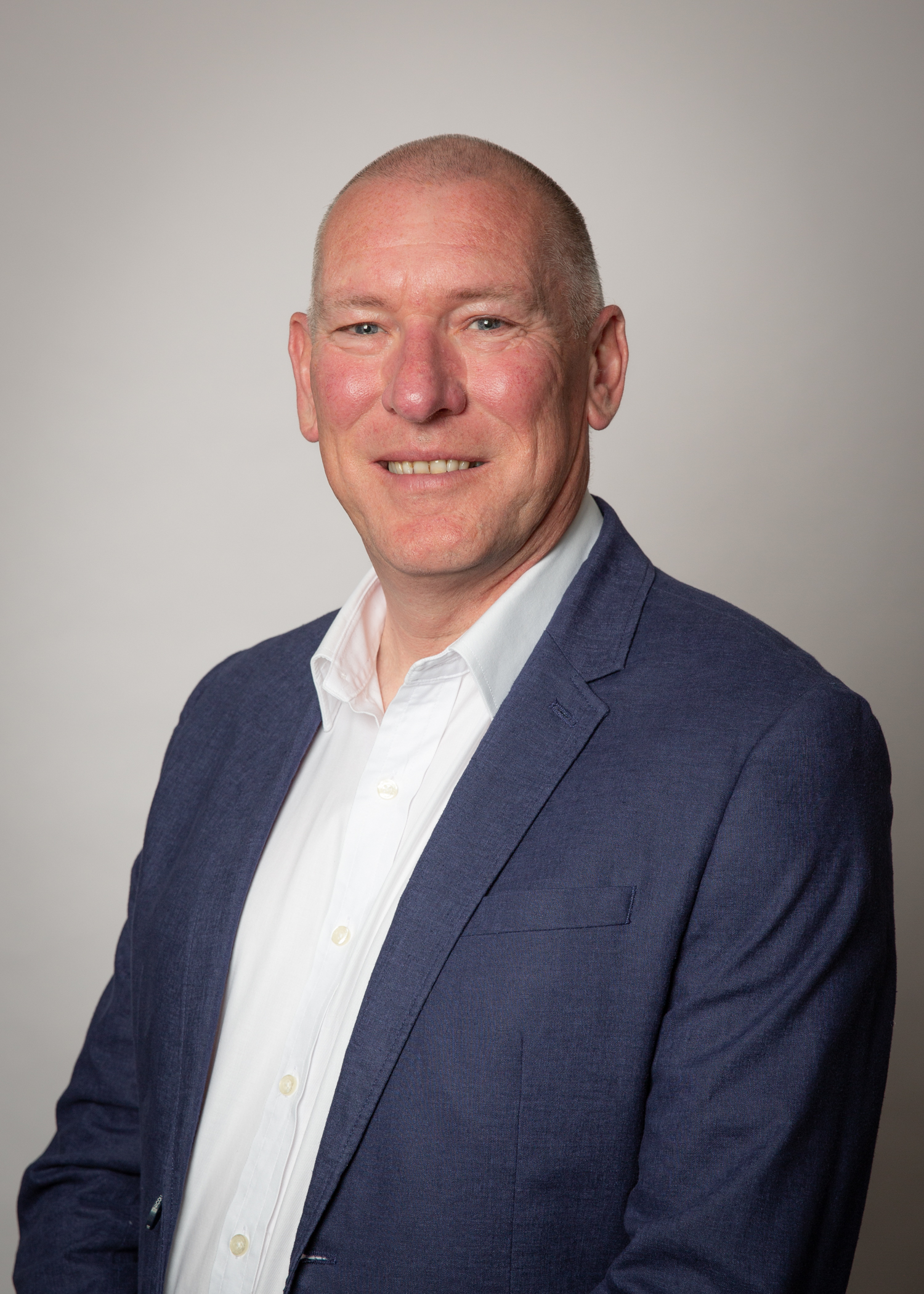 Professional headshot of Garrett McArdle, Senior Financial Advisor at Harmonics, supporting organisations and individuals with financial guidance and advisory services related to workforce transitions and career change.