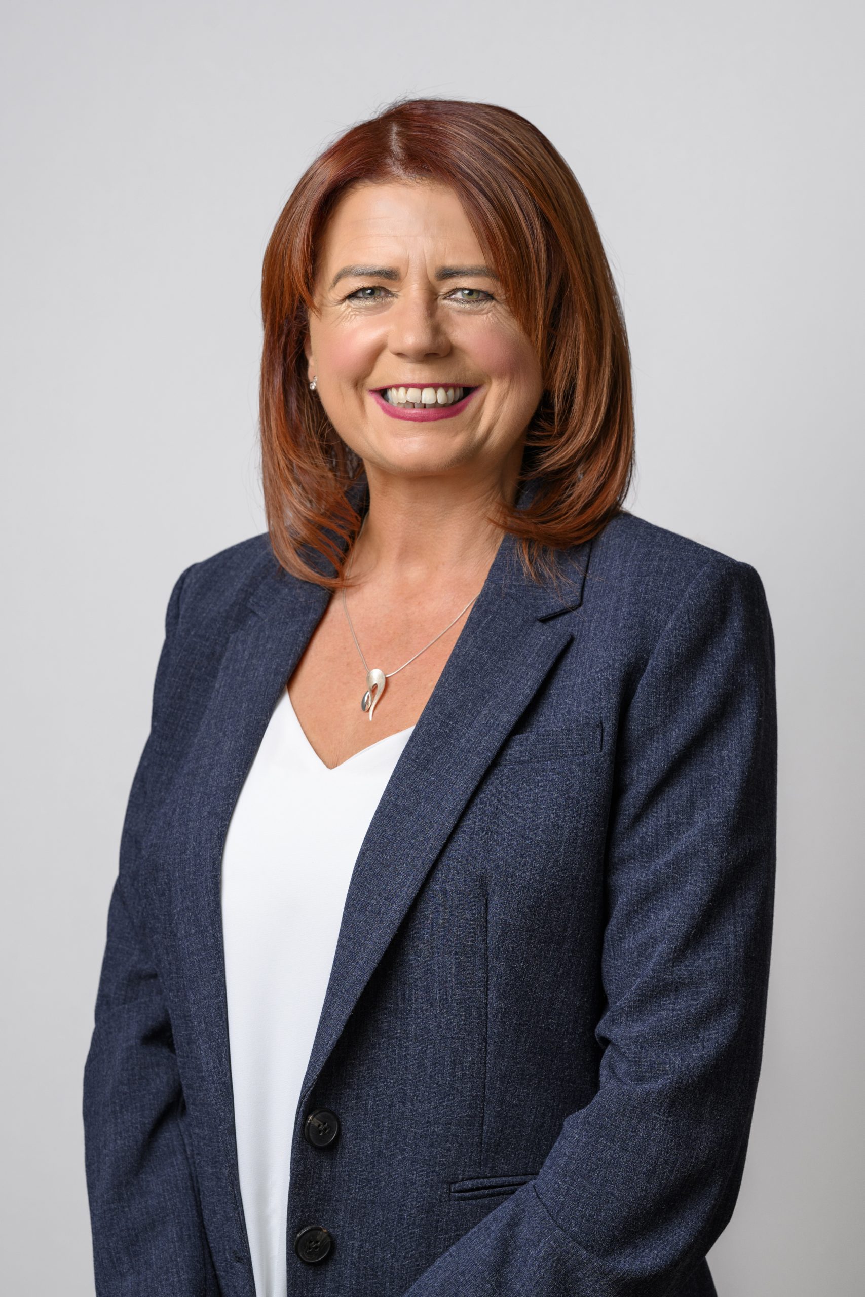 Professional headshot of Órla Murphy, Positive Health Coach & Facilitator, supporting individuals and organisations in improving wellbeing, resilience, and sustainable performance.