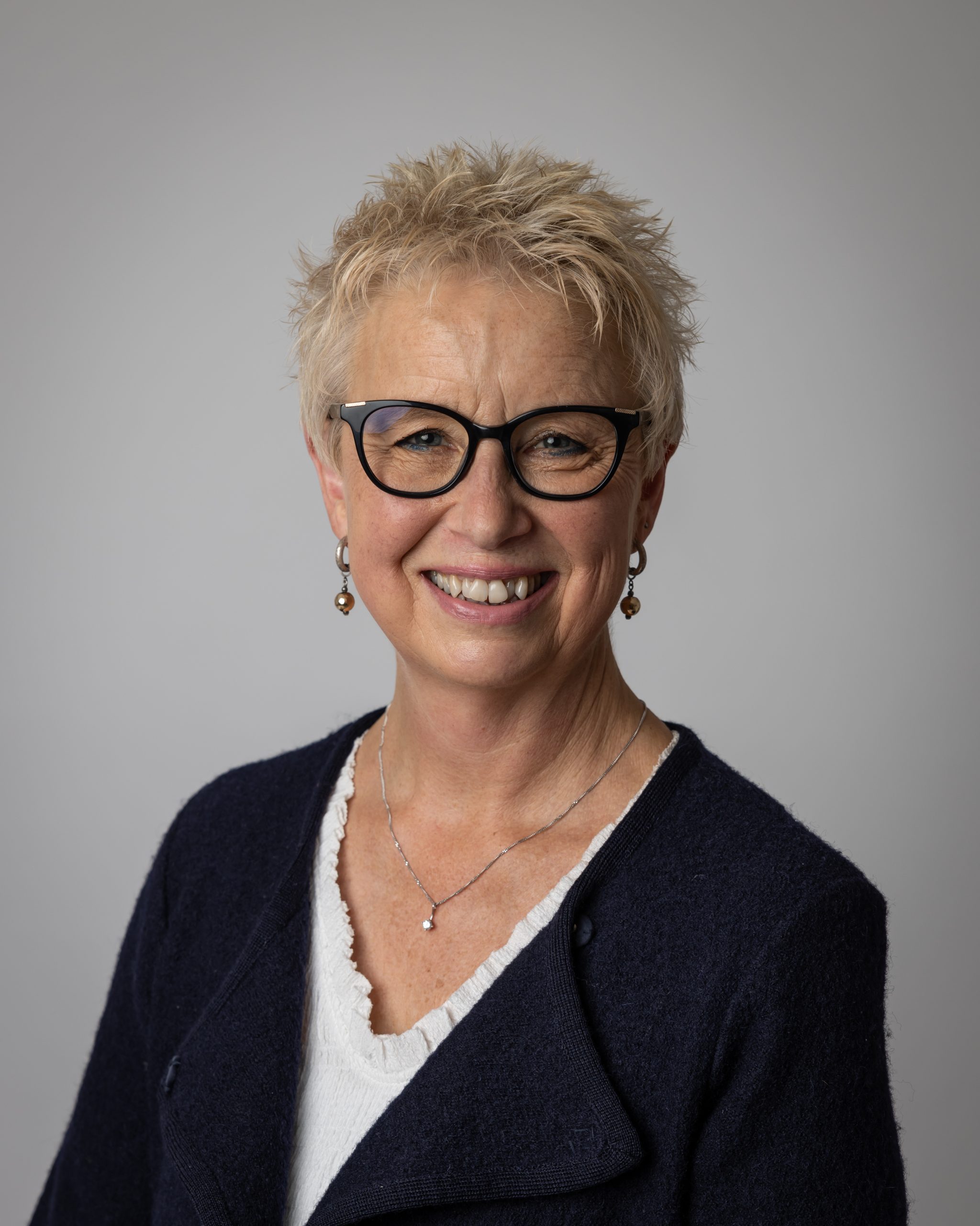 Professional headshot of Eileen Woodford, Executive Coach & Facilitator, supporting leaders and teams in developing stronger leadership capability, communication, and organisational effectiveness.