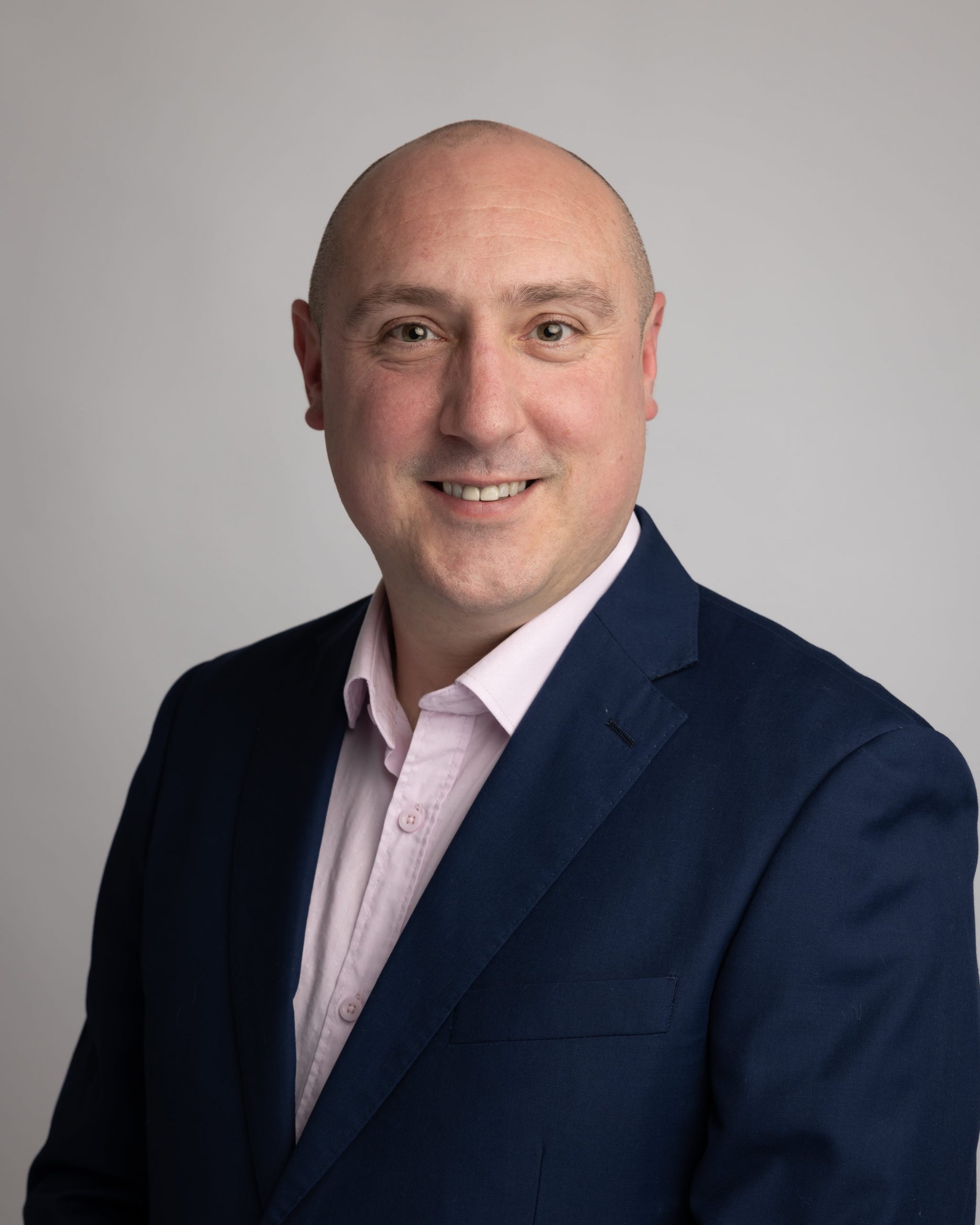 Professional headshot of Alan Kelly, Client Operations Manager, supporting client relationships, operational coordination, and service delivery across organisational projects and partnerships.